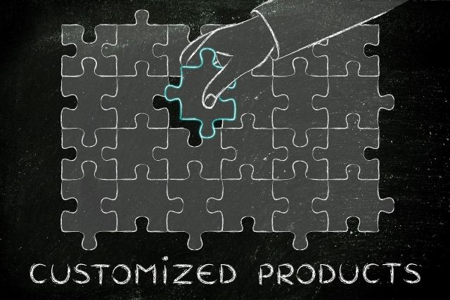 hand completing a puzzle, with text Customized Products